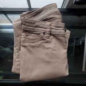 Bootlegger tan mid rise bootleg jeans, size US 25